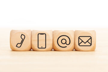 Contact,Us,Icons,In,Wooden,Blocks,On,Wooden,Desk.,Copy